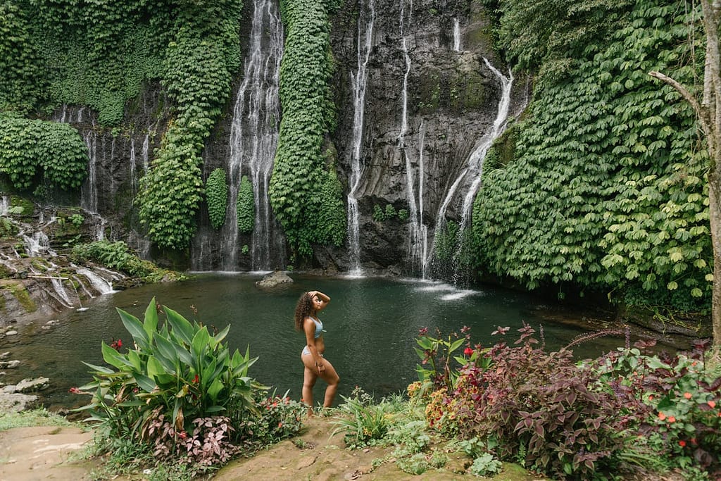 Black woman in Bali at Waterfall