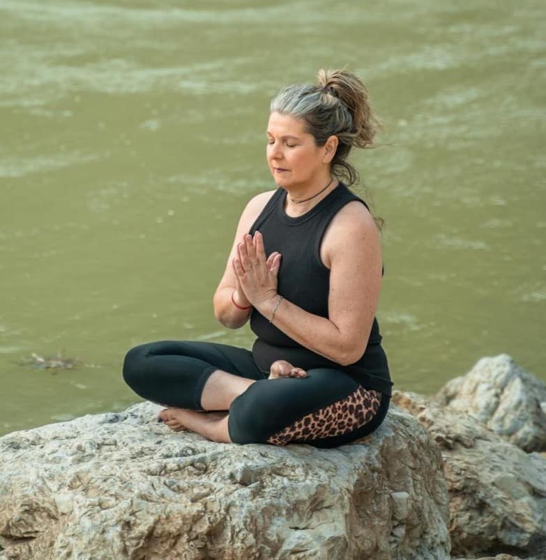 ABOUT US Purple Star Travel Woman Meditating in Bali